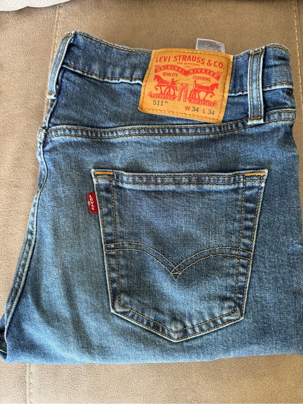 Levi's blue denim jeans with leather patch and red tab